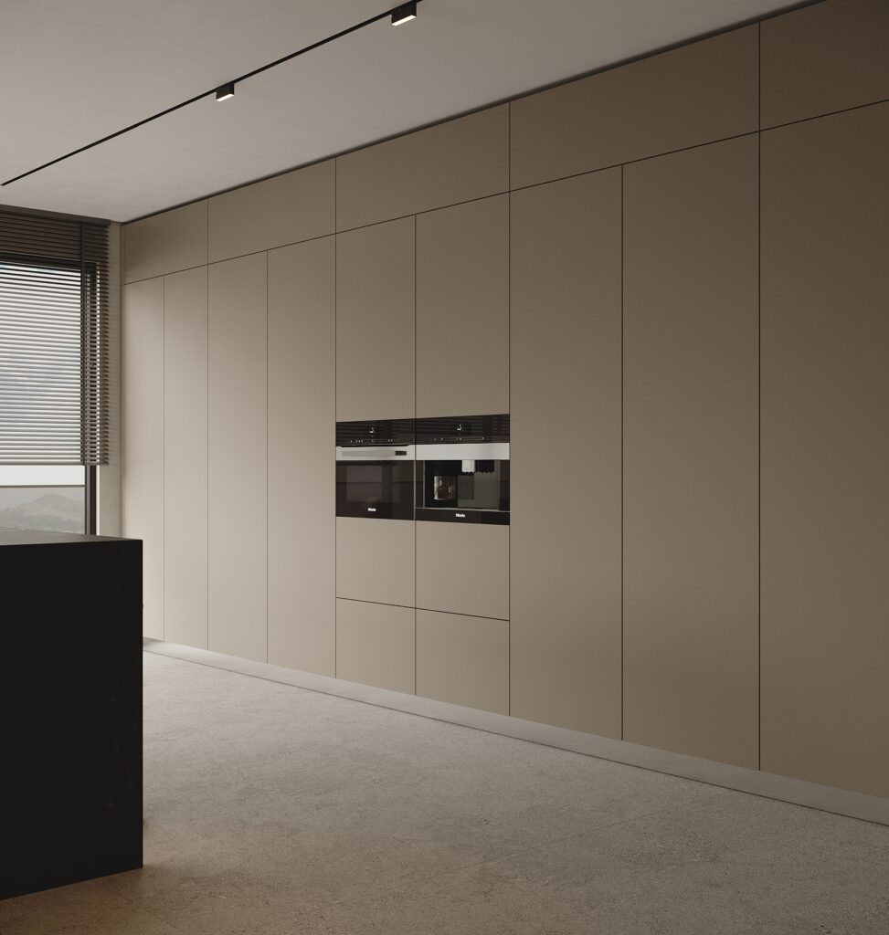 A modern kitchen with minimalist German beige cabinetry, integrated appliances, and a sleek black countertop, bathed in soft natural light.